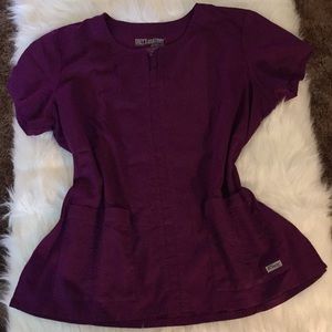 Grey's Anatomy Tops - Grey’s Anatomy Ladies Scrub Top in Purple Grey's Anatomy Tops - Grey’s Anatomy Ladies Scrub Top in Purple